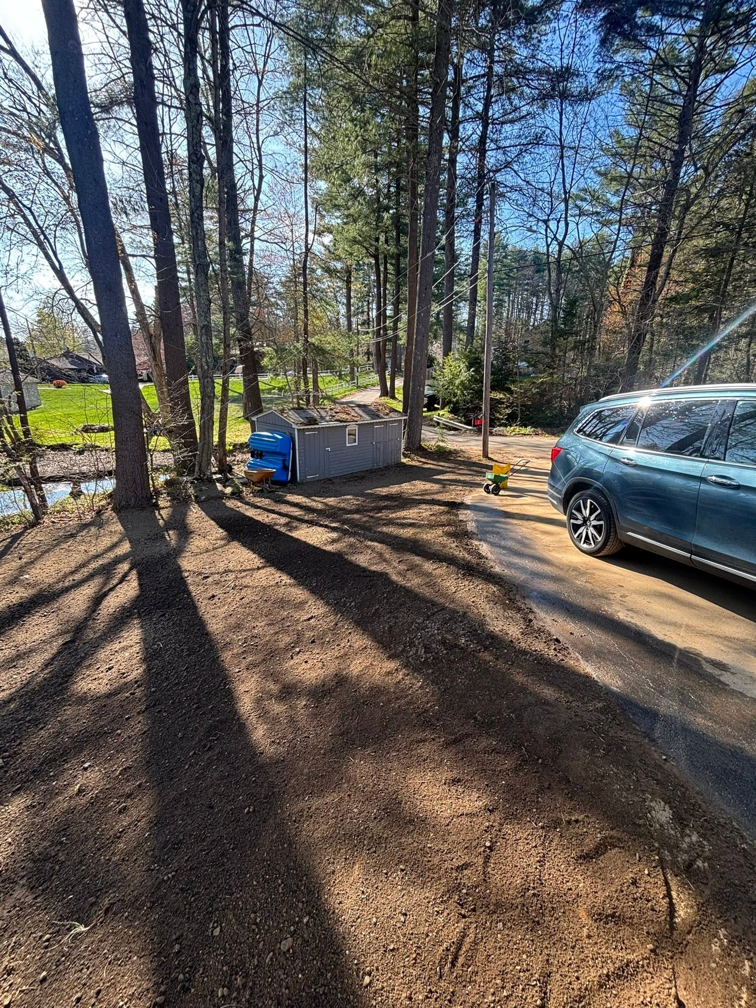 Properly graded and loamed backyard after drainage work